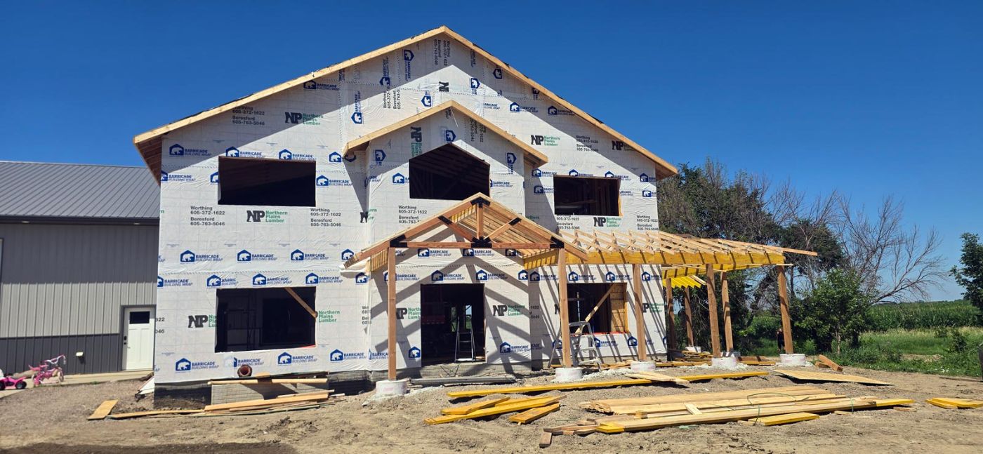 Custom home framing and roof sheathing during construction in South Dakota
