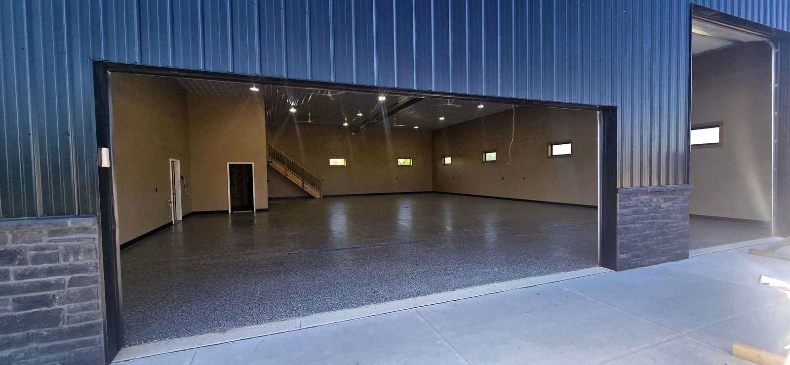 Custom shouse shop interior with epoxy floor and living quarters in Tea, SD