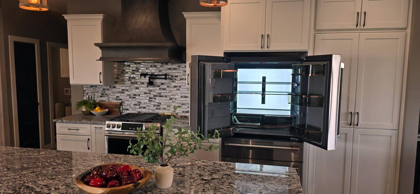 Custom kitchen with white cabinetry, granite island and subway tile backsplash, Hahn Custom Homes